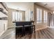 Home bar with seating and ample storage at 9127 E Lynwood St, Mesa, AZ 85207