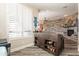 Bar area with rustic cabinetry and beverage storage at 9127 E Lynwood St, Mesa, AZ 85207