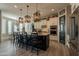 Large kitchen island with seating and modern appliances at 9127 E Lynwood St, Mesa, AZ 85207
