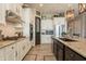 Modern kitchen featuring stainless steel appliances and white shaker cabinets at 9127 E Lynwood St, Mesa, AZ 85207