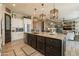 Spacious kitchen with granite countertops, stainless steel appliances, and custom cabinetry at 9127 E Lynwood St, Mesa, AZ 85207