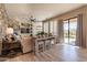 Open living space with stone fireplace and built-ins at 9127 E Lynwood St, Mesa, AZ 85207
