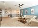 Upstairs loft with sectional sofa and a view to the hallway at 9127 E Lynwood St, Mesa, AZ 85207