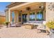 Covered patio with seating area, perfect for outdoor relaxation at 9127 E Lynwood St, Mesa, AZ 85207