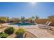 Inviting kidney shaped pool with ample deck space at 9127 E Lynwood St, Mesa, AZ 85207