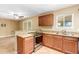 Modern kitchen with granite countertops and stainless steel appliances at 9607 N 41St Dr, Phoenix, AZ 85051