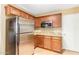 Stainless steel appliances and granite countertops highlight this kitchen at 9607 N 41St Dr, Phoenix, AZ 85051