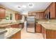 Kitchen boasts granite countertops and modern cabinetry at 9607 N 41St Dr, Phoenix, AZ 85051