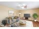 Virtually staged living room features a neutral color palette and stylish furniture at 9607 N 41St Dr, Phoenix, AZ 85051