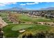 Aerial view of a golf course community with mountain views at 10232 N 54Th Pl, Paradise Valley, AZ 85253