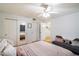 Bedroom with a sofa bed and mirrored closet doors at 10232 N 54Th Pl, Paradise Valley, AZ 85253