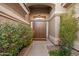Inviting entryway with double doors and landscaping at 10232 N 54Th Pl, Paradise Valley, AZ 85253