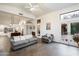 Open living room featuring vaulted ceilings,tile flooring and access to backyard at 10232 N 54Th Pl, Paradise Valley, AZ 85253