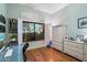 Home office with built-in shelving and large window at 10232 N 54Th Pl, Paradise Valley, AZ 85253