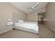 Spacious bedroom with plush carpet and patio access at 10405 N 65Th Dr, Glendale, AZ 85302