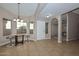 Small dining area with a round glass-top table and chairs at 10405 N 65Th Dr, Glendale, AZ 85302