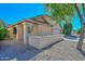 Single-story home with desert landscaping, and a two-car garage at 10405 N 65Th Dr, Glendale, AZ 85302
