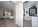Large walk-in closet with ample shelving and drawers at 10405 N 65Th Dr, Glendale, AZ 85302