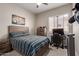 Cozy bedroom with striped bedding and built-in desk at 14806 E Crested Crown --, Fountain Hills, AZ 85268