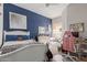 Bright bedroom featuring a white bed frame and a pink gaming chair at 14806 E Crested Crown --, Fountain Hills, AZ 85268