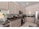 Well-equipped kitchen with granite countertops and light cabinets at 14806 E Crested Crown --, Fountain Hills, AZ 85268