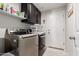 Functional laundry room with washer, dryer, and ample cabinet space at 14806 E Crested Crown --, Fountain Hills, AZ 85268