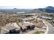 Aerial view of two luxury homes nestled in a desert landscape at 14849 E Valley Vista Dr, Fountain Hills, AZ 85268