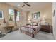 Comfortable bedroom with a metal bed frame and large window at 14849 E Valley Vista Dr, Fountain Hills, AZ 85268