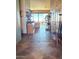 Bright entry hall with tile floors and views to the living room and backyard at 14849 E Valley Vista Dr, Fountain Hills, AZ 85268