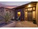 Stone entryway with double doors and sitting area at 14849 E Valley Vista Dr, Fountain Hills, AZ 85268