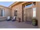 Stone entryway with double doors and sitting area at 14849 E Valley Vista Dr, Fountain Hills, AZ 85268