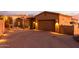 Two-car garage with paver driveway and landscape lighting at 14849 E Valley Vista Dr, Fountain Hills, AZ 85268