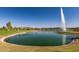 Scenic lakefront property with a large fountain and tranquil waters at 14849 E Valley Vista Dr, Fountain Hills, AZ 85268