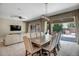 Dining room with sliding glass doors to backyard at 15677 W Almeria Rd, Goodyear, AZ 85395