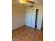 Bedroom with wood-look flooring and double door closet at 15835 S 30Th Pl, Phoenix, AZ 85048