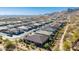 Community view showing multiple houses with tile roofs and desert landscape at 21122 W Edgemont Ave, Buckeye, AZ 85396