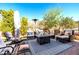 Relaxing backyard patio with seating area and outdoor heater at 21122 W Edgemont Ave, Buckeye, AZ 85396