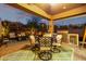 Outdoor kitchen and patio furniture create a perfect space for entertaining at 21122 W Edgemont Ave, Buckeye, AZ 85396