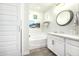 Clean bathroom with soaking tub and double vanity at 21122 W Edgemont Ave, Buckeye, AZ 85396