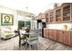 Charming breakfast nook features a round table and chairs, perfect for casual dining at 21122 W Edgemont Ave, Buckeye, AZ 85396