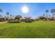 Spacious grassy area with a community building at 21122 W Edgemont Ave, Buckeye, AZ 85396