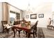 Formal dining room with chandelier and hardwood floors at 21122 W Edgemont Ave, Buckeye, AZ 85396