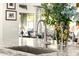 Sleek kitchen sink and faucet with a modern design and granite countertop at 21122 W Edgemont Ave, Buckeye, AZ 85396