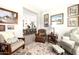 Open living room with view into kitchen and gallery wall at 21122 W Edgemont Ave, Buckeye, AZ 85396