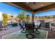 Outdoor patio with seating area, grill, and built-in bar at 21122 W Edgemont Ave, Buckeye, AZ 85396