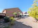 Landscaped backyard with raised garden beds and trees at 21209 N 40Th Ave, Glendale, AZ 85308
