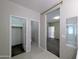 Bathroom with shower, toilet, and walk-in closet at 21209 N 40Th Ave, Glendale, AZ 85308