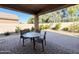 Covered patio with seating area and view of backyard at 21209 N 40Th Ave, Glendale, AZ 85308