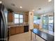 Kitchen with wood cabinets, stainless steel appliances, and tile floor at 21209 N 40Th Ave, Glendale, AZ 85308