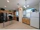 Modern kitchen boasts stainless steel appliances and ample cabinet space at 21209 N 40Th Ave, Glendale, AZ 85308